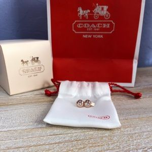 Authentic Coach rose gold stud earrings